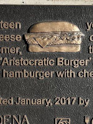 The Birthplace of the Cheeseburger. A bronze plaque on the ground @ the former Rite Spot in Pasadena. In 1924 Lionel Sternberger created it.