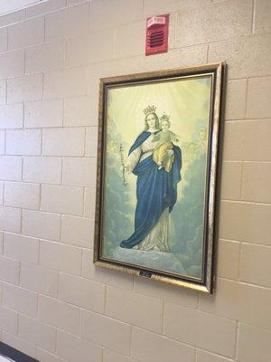 Beautiful image of Mary Help of Christians in office corridor