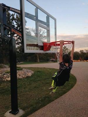 Height adjustable Goalsetter basketball hoops with pro-grade backboards.