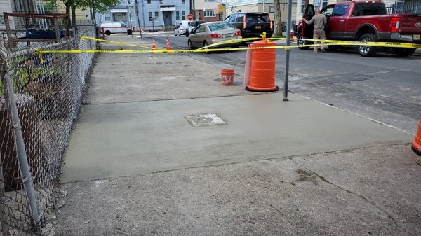 The finished sidewalk section after the pour in Jersey City.