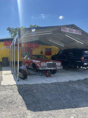 Me working on my '79 Cadillac CV Axles at their shop since they were nice enough to hook me up with the tools to get it done