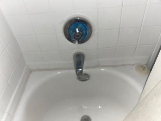 Cracks all around the tub. When asking maintenance to fix it they said that they would to wait until the tub falls.