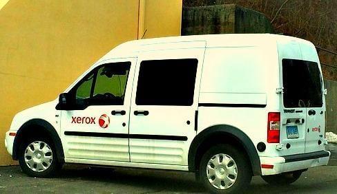 Here is one of 30 service trucks in Xerox's local fleet. When one of these come around, you know your problems will be solved