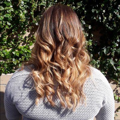 This is a blend between balayage and ombre look,  I love the toffee blonde look.  Great for darker skin tones!