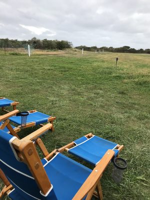 Lounge chairs overlooking a big field. Perfect for coffee or a book.