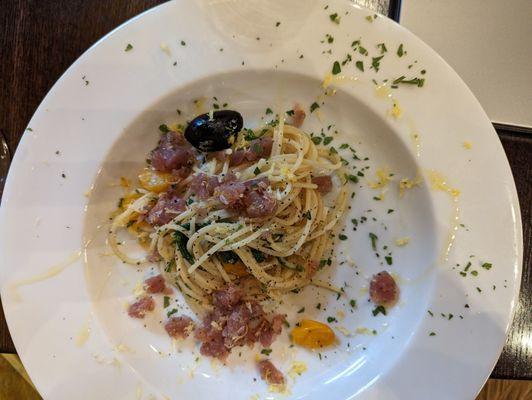 Carbonara Marinara with Ahi tuna and quail eggs