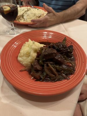 Pepper steak and mashed potatoes special