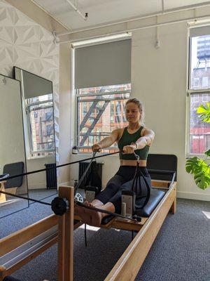 Client Ilse on the Pilates Reformer