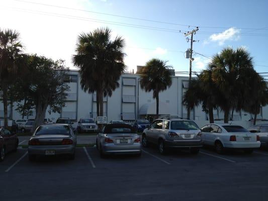 Photo of rear parking lot and entrance.