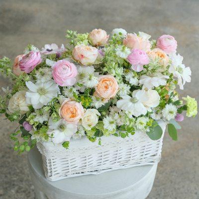 This basket of anemone, ranunculus, peony roses, Larkspur and nigela is a showstopper!