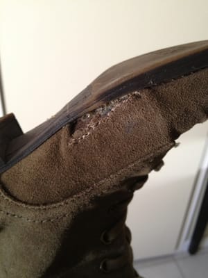 My poorly repaired boot that cost me $30.00 plus tax. Great service but poor workmanship. Needless to say I'm not happy.