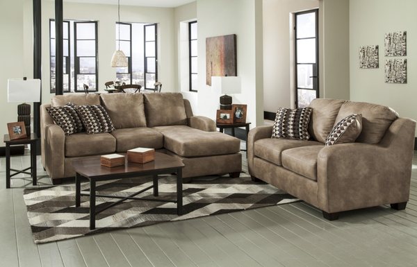 The "Alturo-Dune" upholstery collection features soft leather look fabric With the versatile sofa chaise design.