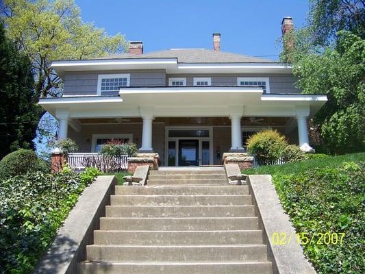 Front of house, after job was complete, they had the front porch ceilings rebuilt and stain done. Very nice stain work