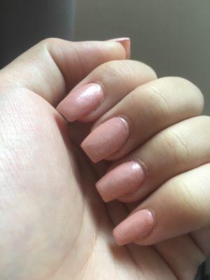 Like look at these! The reviews on google said 5 stars but no that's a lie! Look at the cuticles and the waves on the nails! Horrible!