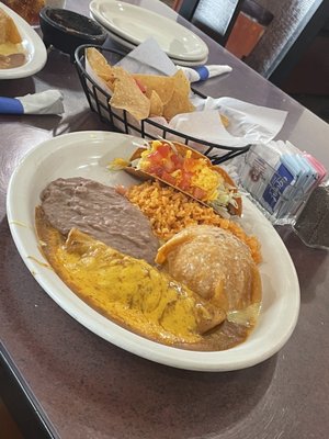 Crunchy taco and beef enchiladas combo served with refried beans and rice. VERY GOOD!