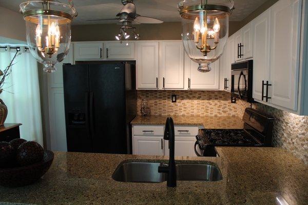 Hammer Nails installed granite countertops, backsplash, LED track lights ceiling fans and overhead lighting.
 Lawrenceville, GA 30044