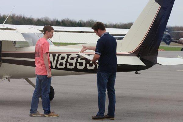 Murfreesboro Aviation CFI with students before first flight.