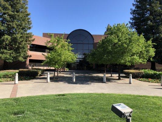 Front of the new building, walk in the front and the store is directly to right.