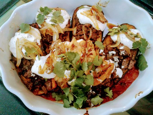 Syrian style stuffed eggplant with a yogurt sauce topping