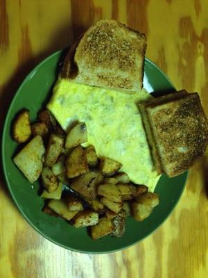 Awesome meat lovers omelette with extra crispy homefries and sour dough toast... amazing!