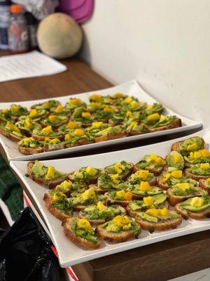 Avocado toasts with Chopped mango and fresh cilantro