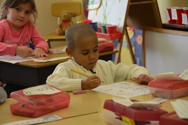 4k students working on a class paper.