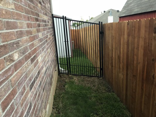 Custom build metal fence with gate.