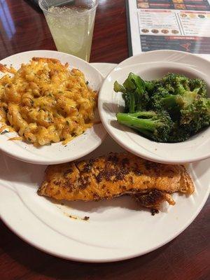 Impeccably seasoned grilled salmon, mac and cheese, and broccoli