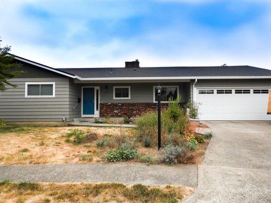 Exterior paint and new garage door.