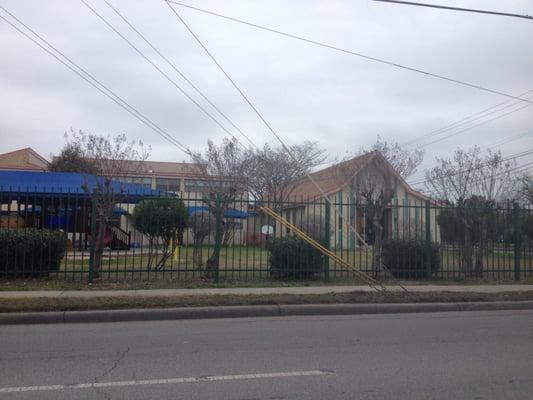 Early childhood building and playground and Sisters convent (original West Commerce campus buildings)