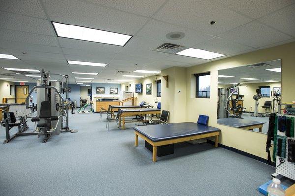 The large open treatment space inside the Shrewsbury location of Atlantic Physical Therapy Center.