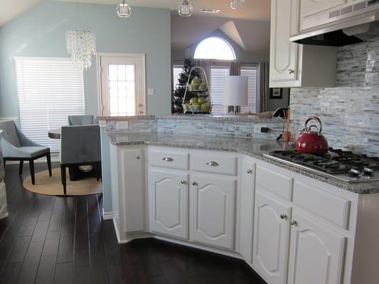 glass tile kitchen backsplash and handscraped engineered hardwood floors