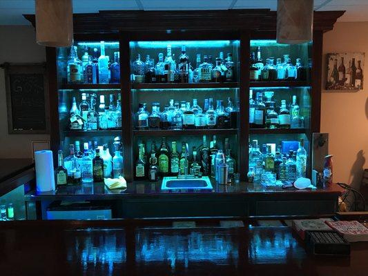 LED multi-color strip lighting installed inside bar.