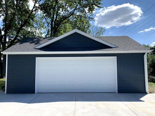 Two Car Garage With Reverse Gable Roof.