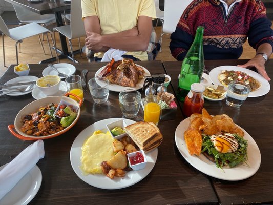 l - r Smoked Cauliflower Scramble, scrambled egg, Avocado Toast, El Paso Huevos Rancheros and NOLA Bananas Foster French Toast