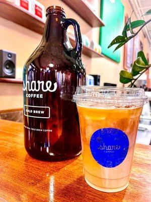 Cold brew available in to-go growlers & a large iced coffee with milk