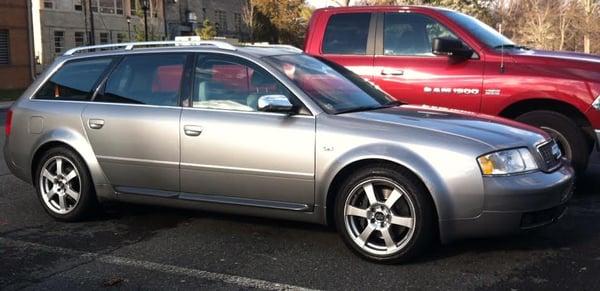 Finished rear quarter panel after a dent was fixed across the flared fender.