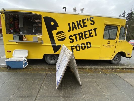 Jake's Street Food truck parked outside the co-op supply