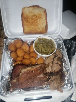 Brisket, Ribs, Green beans and Corn nuggets with complimentary Texas toast