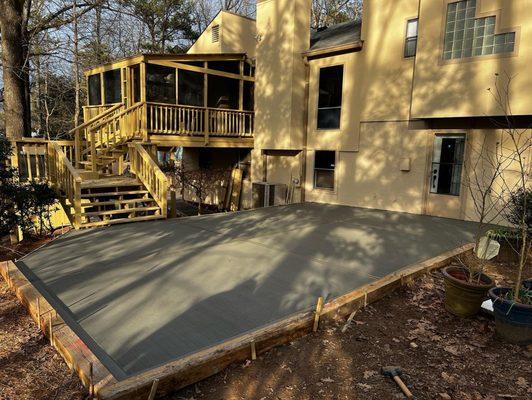 Backyard patio area graded and poured back in Marietta, GA.