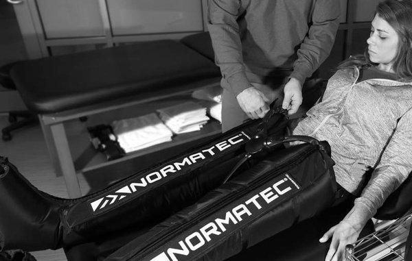 Normatec Recovery boots, hips and arms.