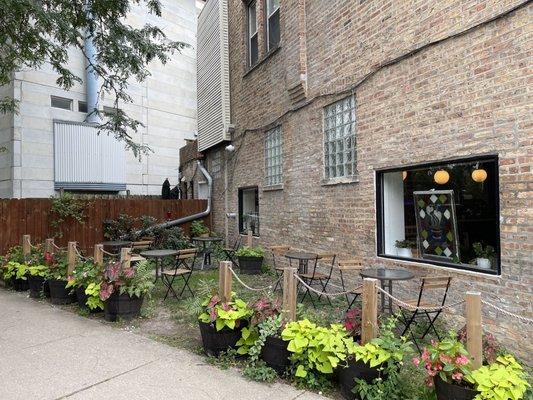 Outdoor seating along Racine.