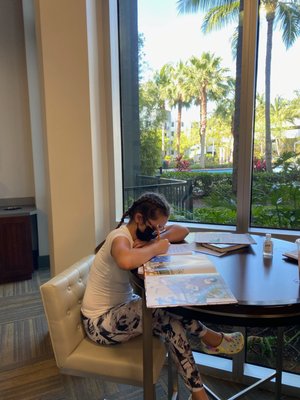 My student working hard at her studies this summer.