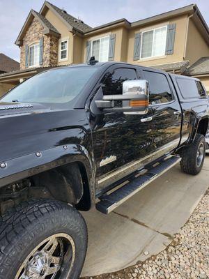 Bruised and battered, now it looks like glass! Professionals in Paintless dent repair.