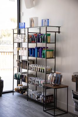 Product shelf including R+Co, R+Co Bleu and Oribe