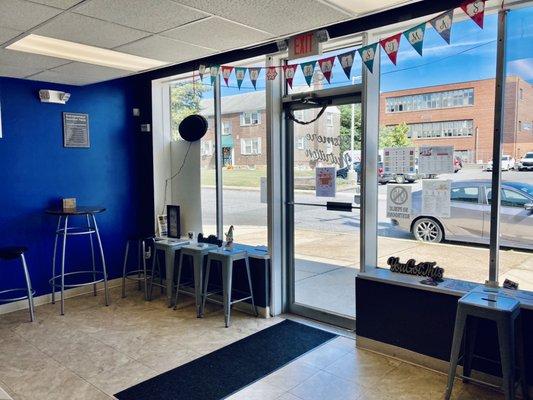 Inside the shop, small seating area