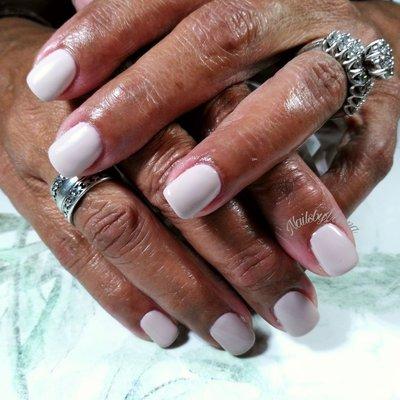 Nude gel manicure.