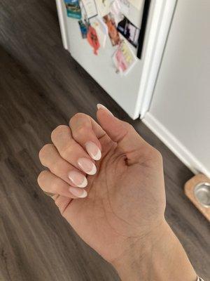 Nude french powder extensions with almond tip by Vanessa