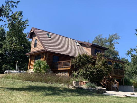 McElroy Metal- Max Rib color: Tudor Brown
Cedar Shake Vinyl Siding
Velux Skylights