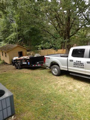 Hauling away junk out of a storage shed in Fairview, TN